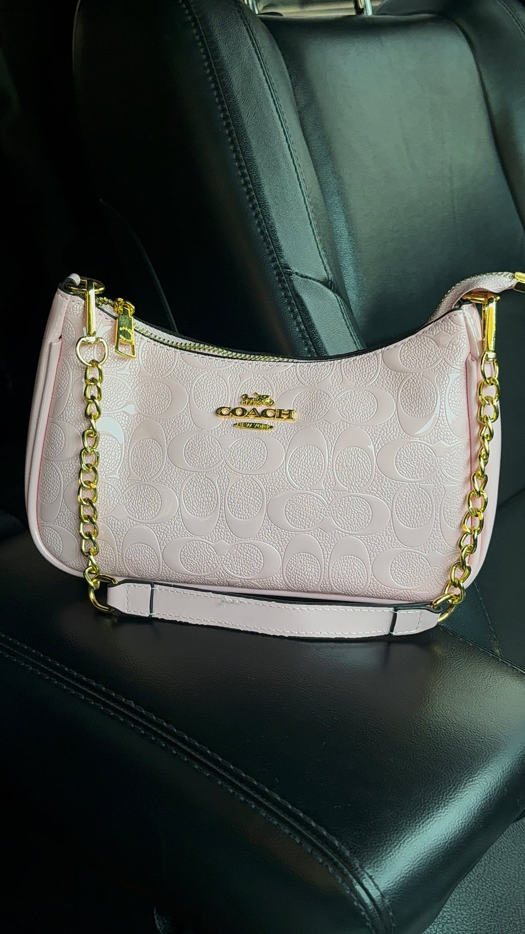 Soft pink purse with gold straps