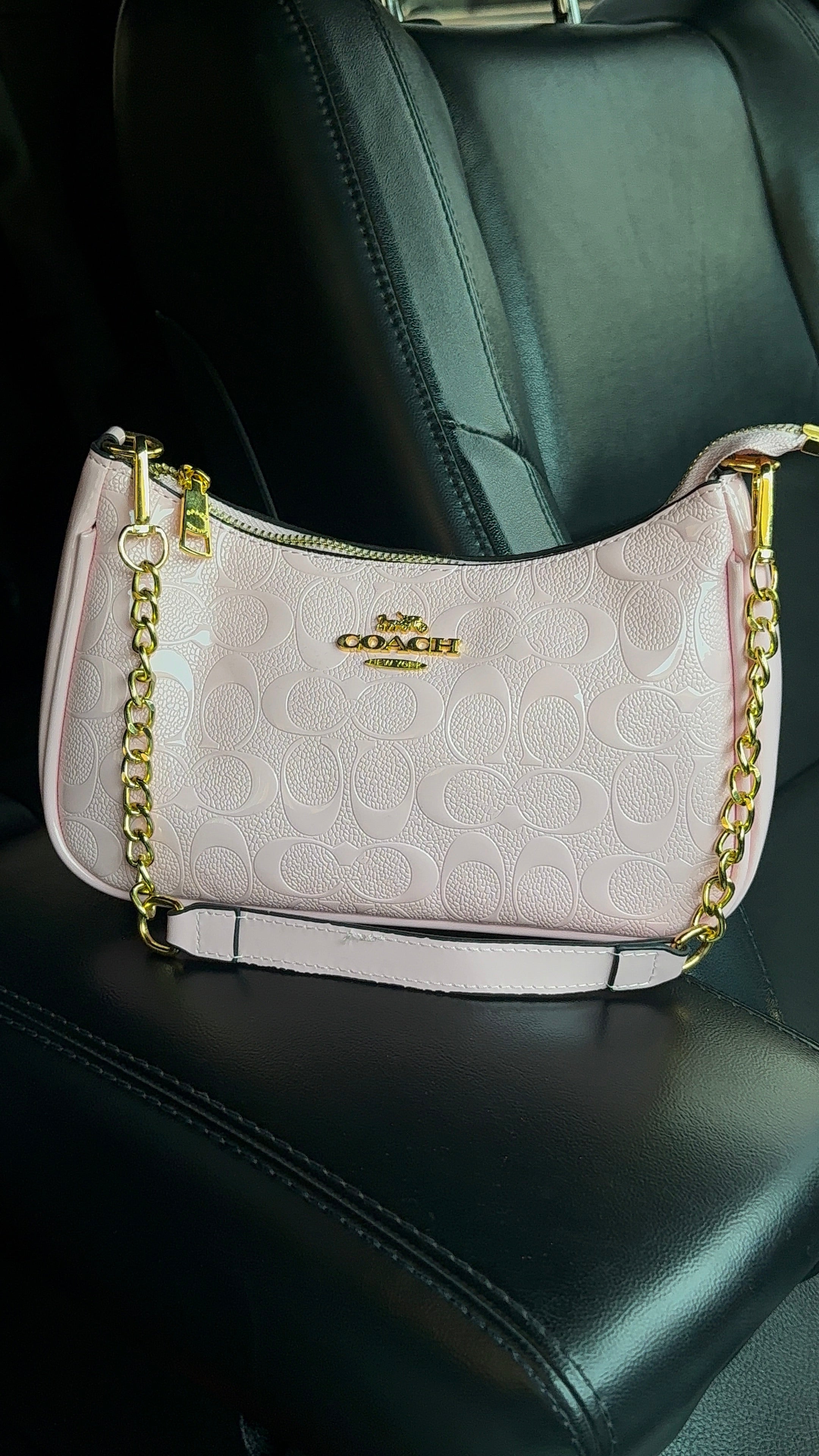 Soft pink purse with gold straps