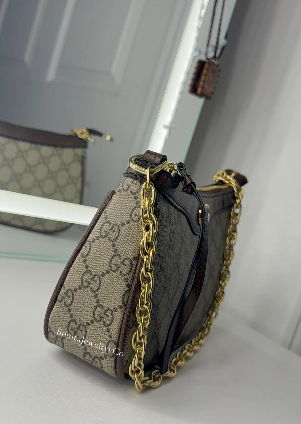GG cross body purse