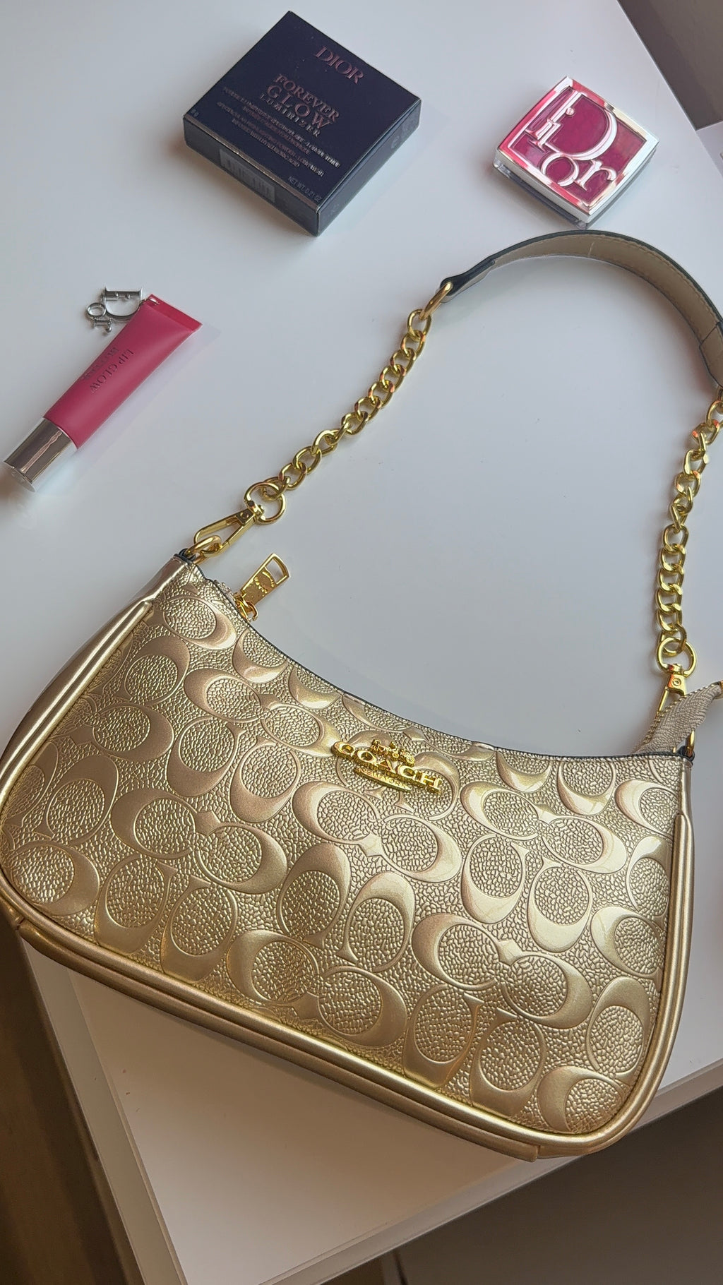 Gold purse with gold straps