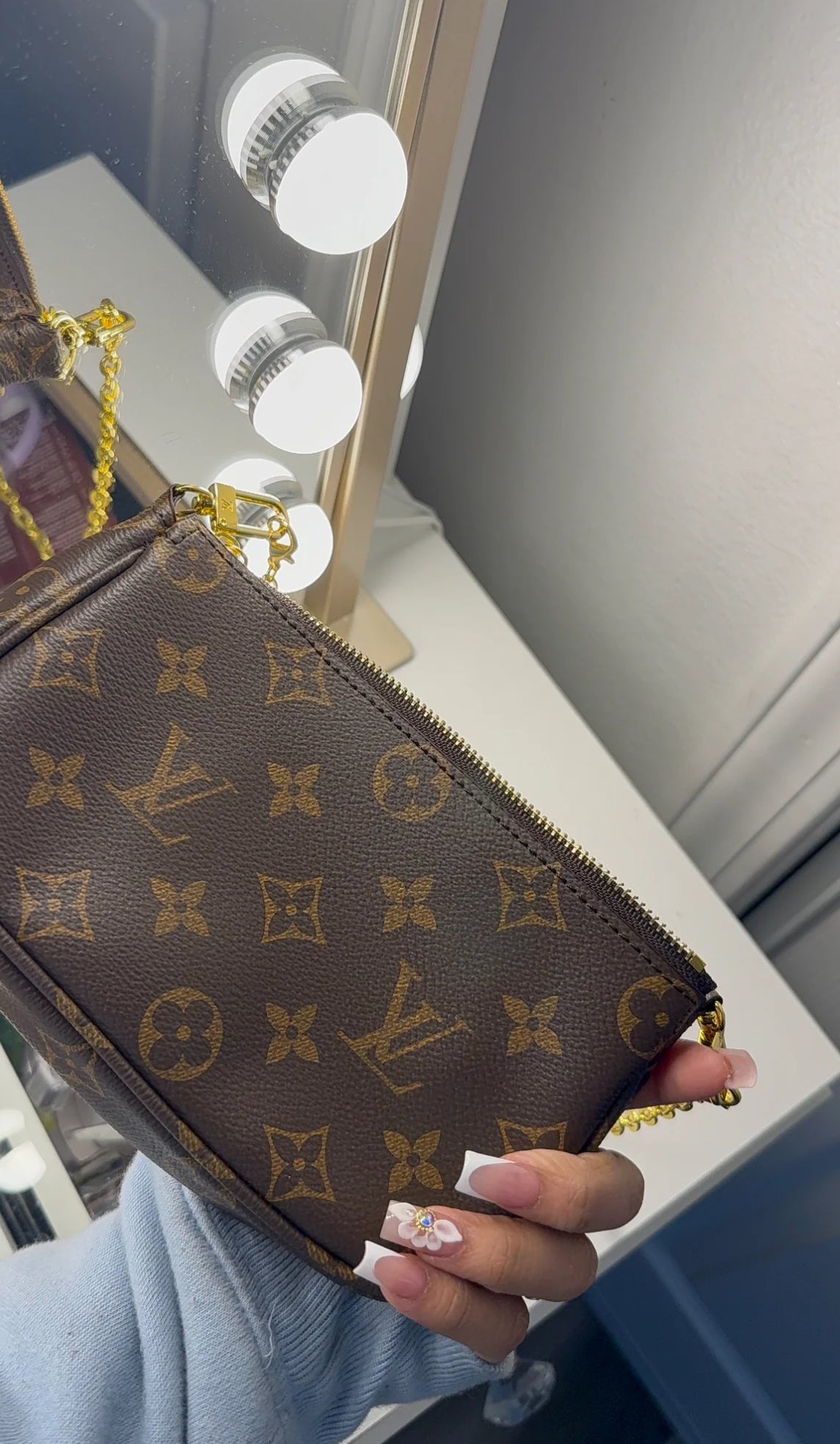 Small monogram purse with gold strap