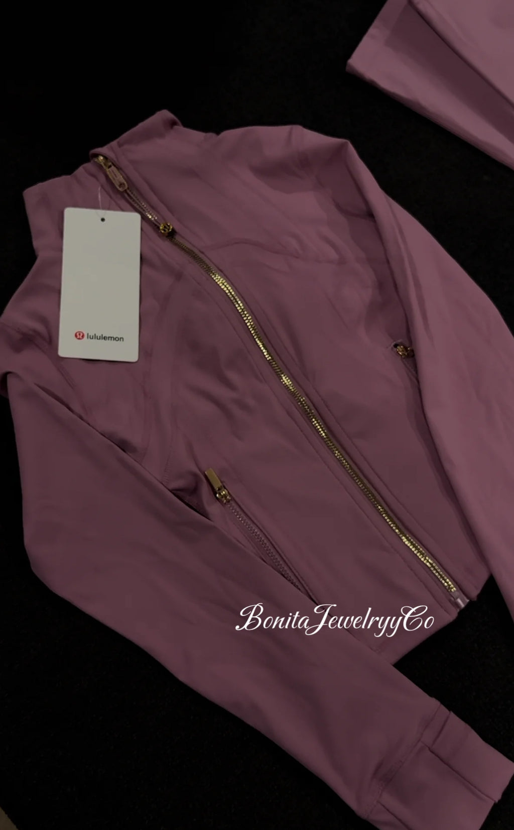 Purple pinkish cropped Lulu define jacket with gold zipper