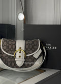 White vintage purse with cross body strap