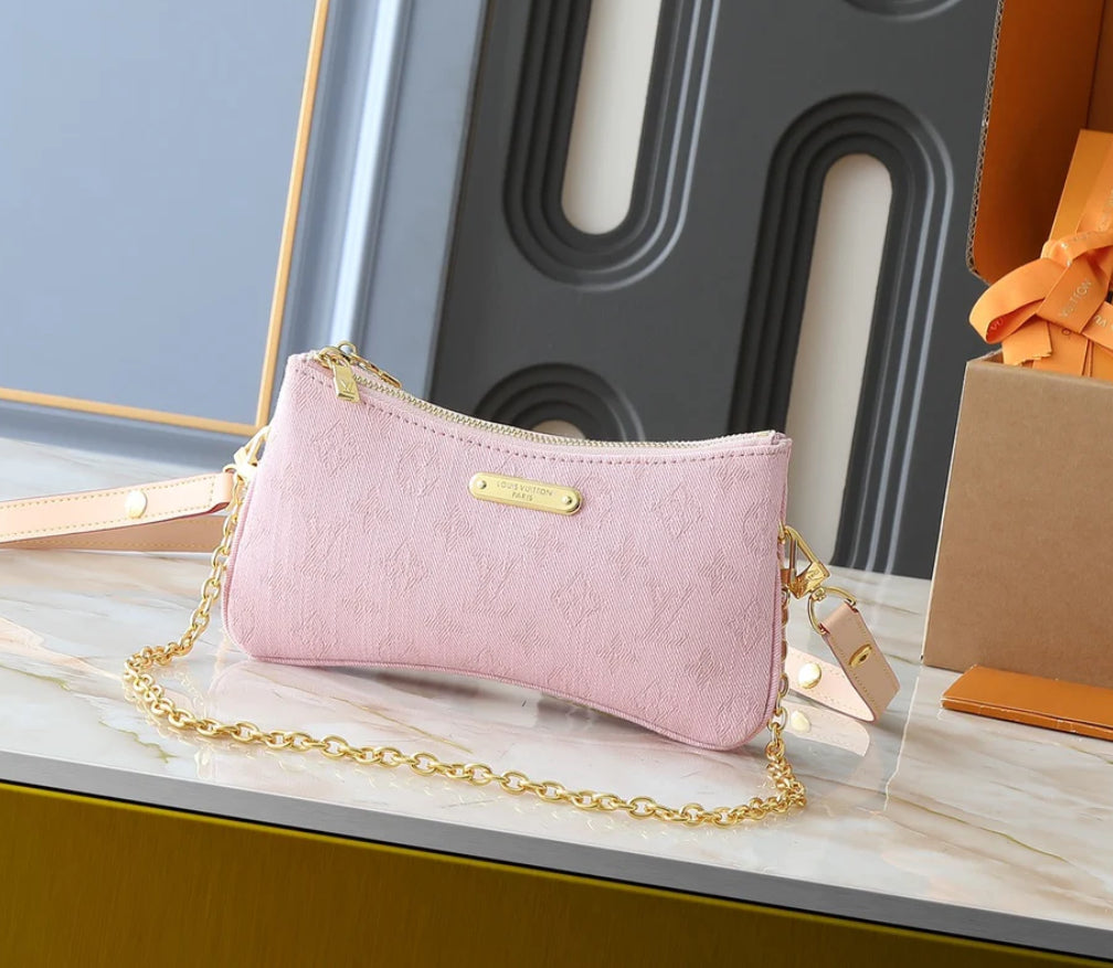 Pink monogram denim purse