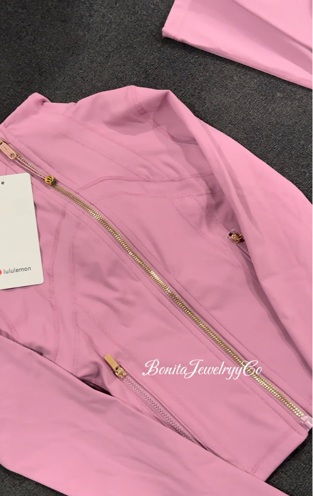 Purple pinkish cropped Lulu define jacket with gold zipper