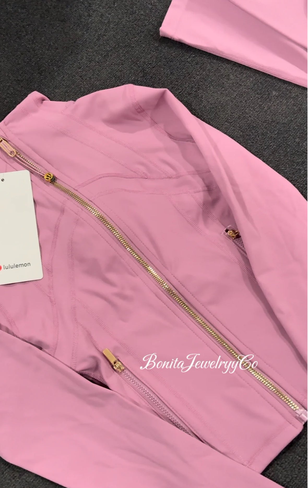 Purple pinkish cropped Lulu define jacket with gold zipper