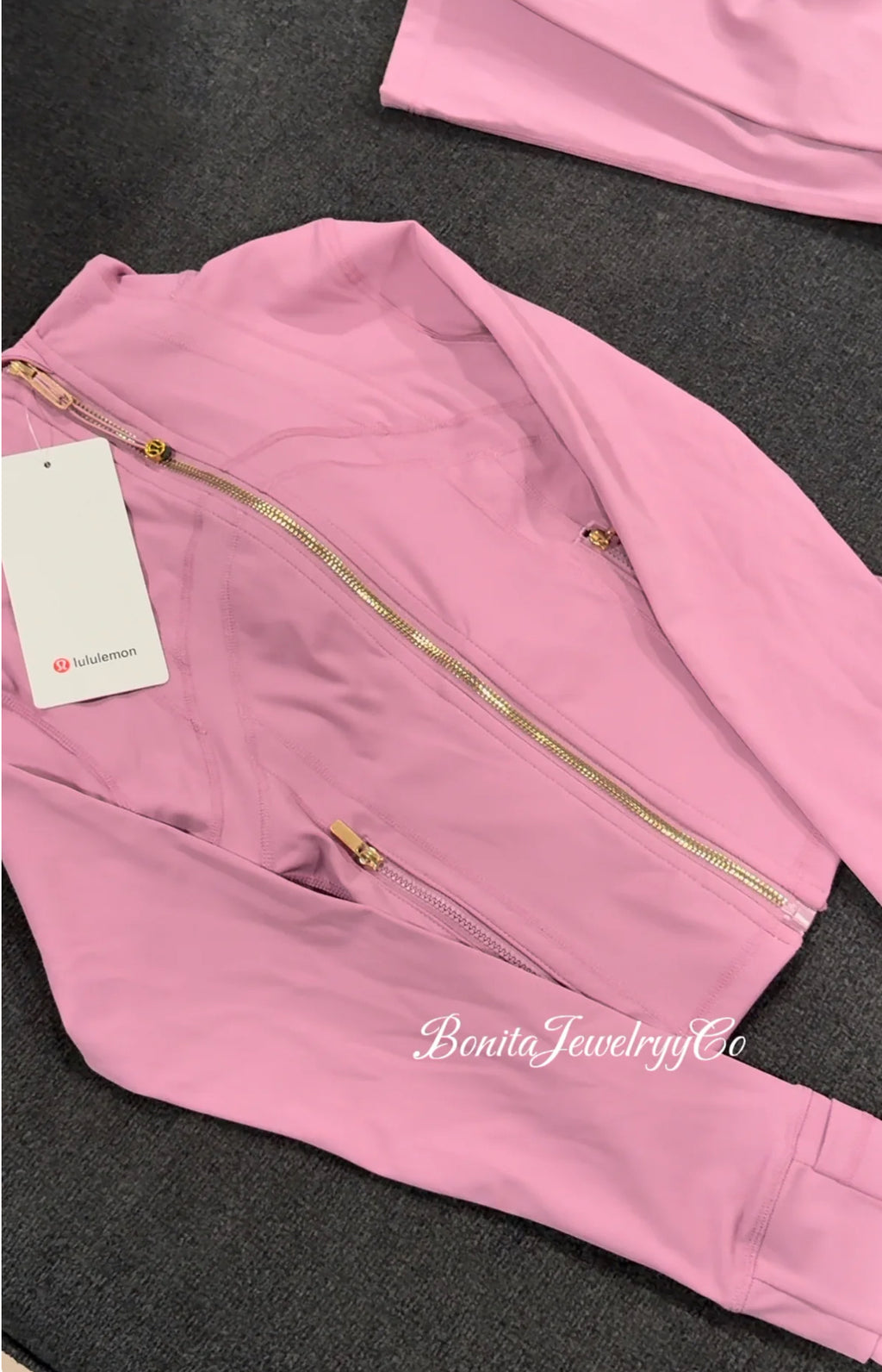 Purple pinkish cropped Lulu define jacket with gold zipper