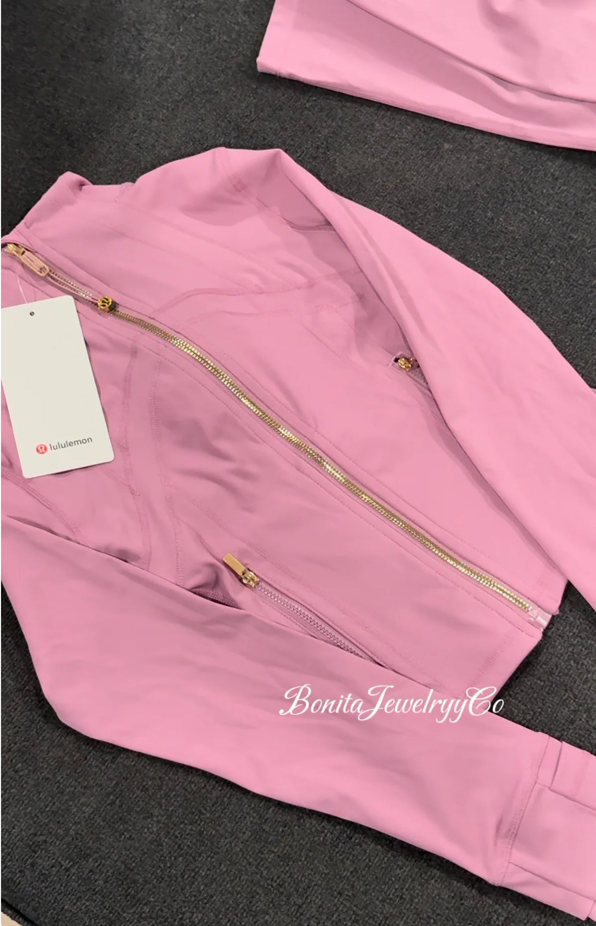 Purple pinkish cropped Lulu define jacket with gold zipper