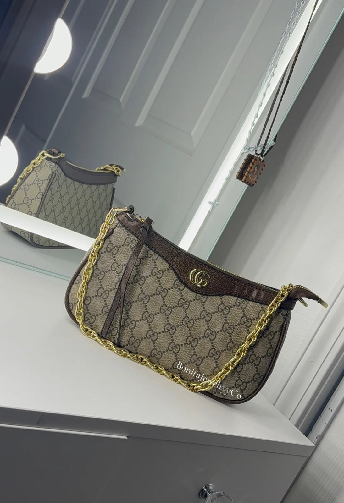 GG cross body purse