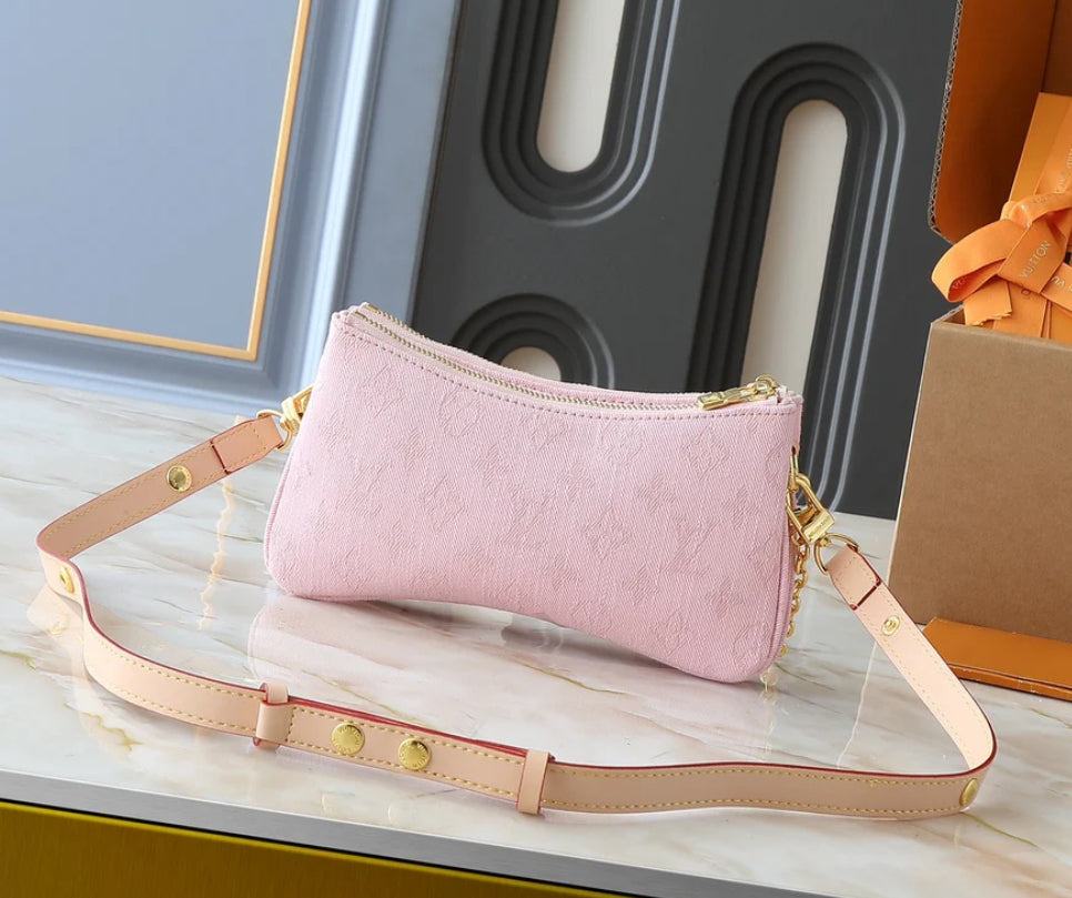 Pink monogram denim purse