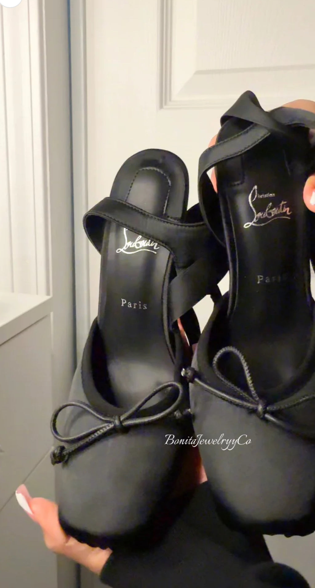 Black ballerina heels with red sole
