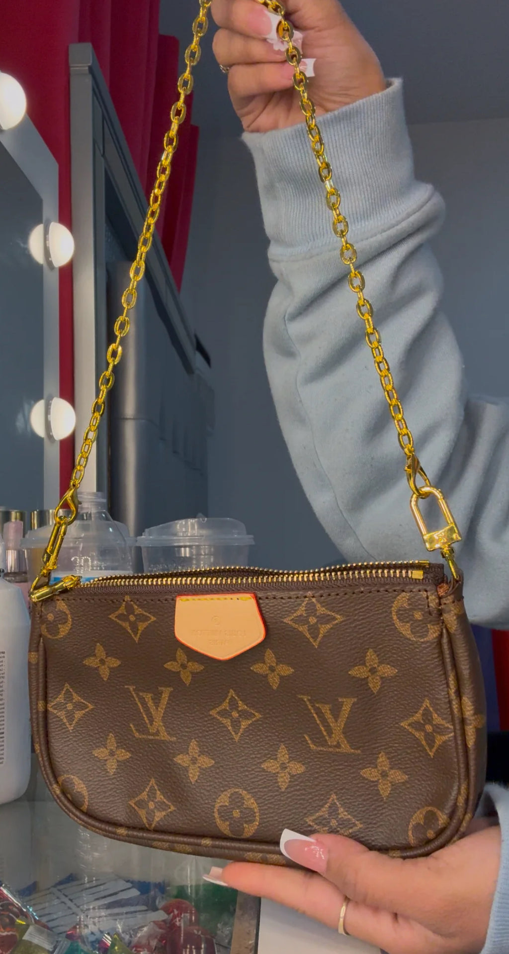 Small monogram purse with gold strap