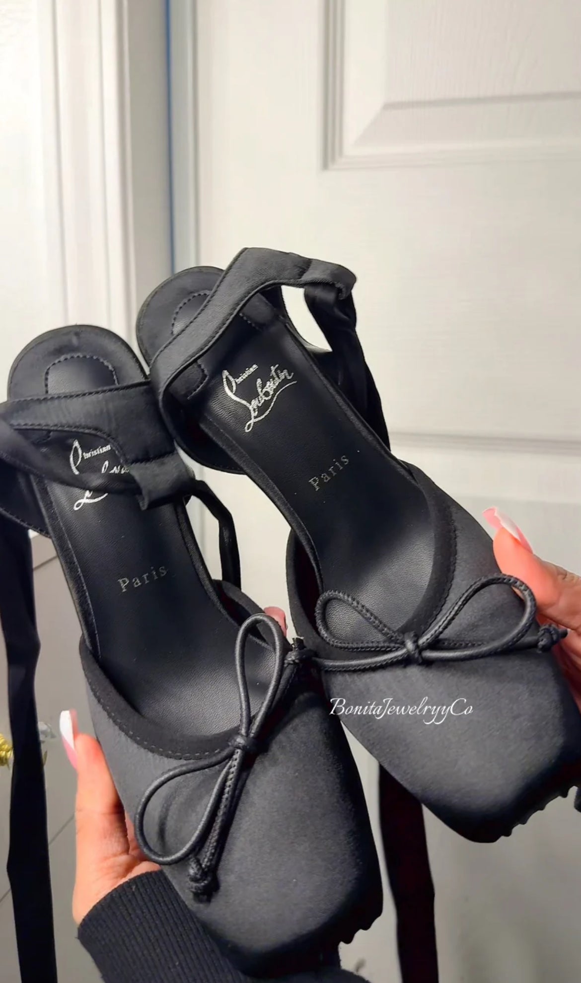 Black ballerina heels with red sole