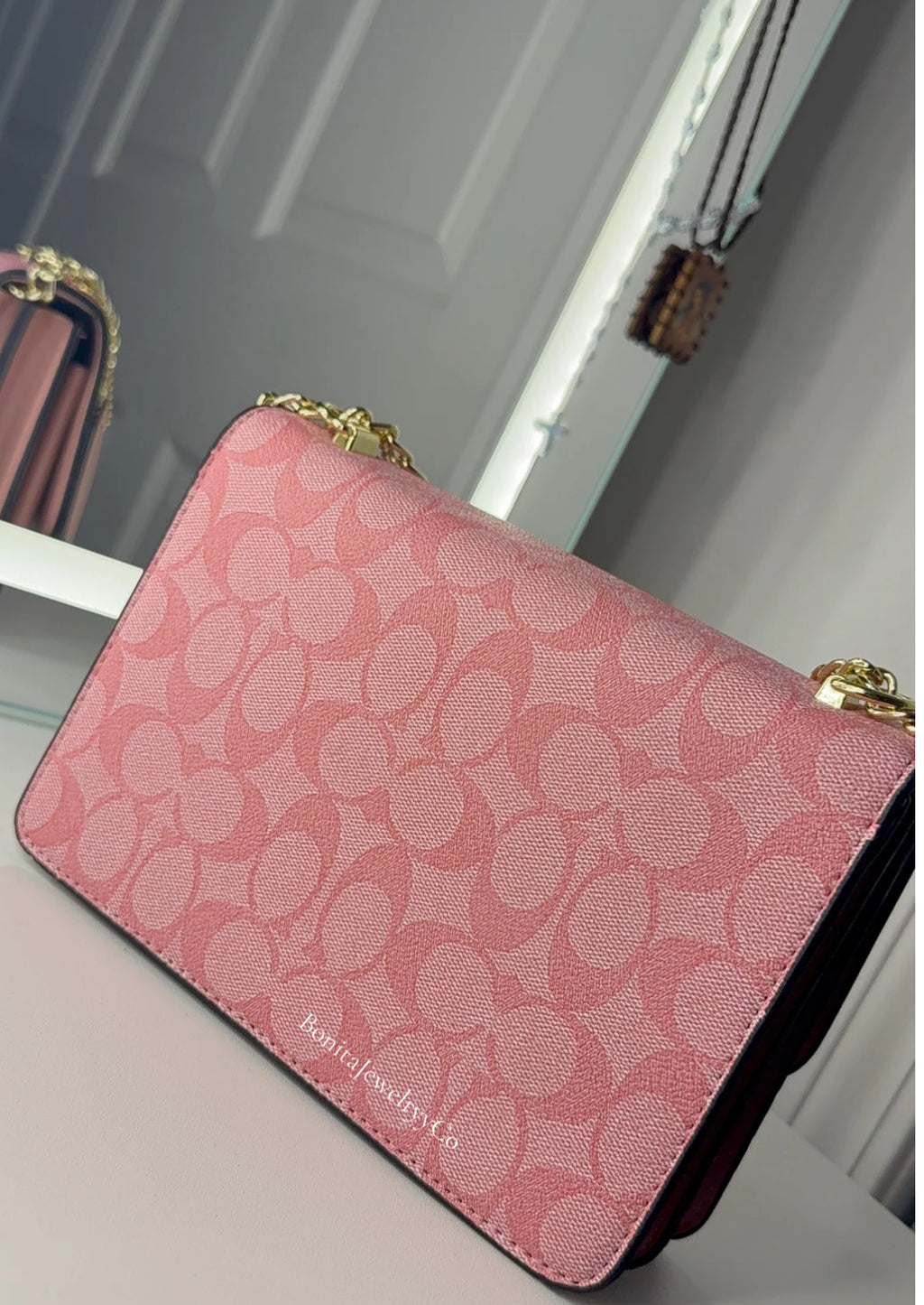 Pink cross body purse
