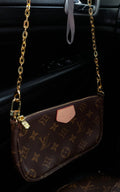 Small monogram purse with gold strap