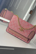 Pink cross body purse