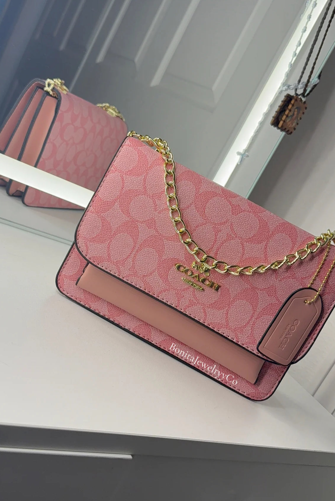 Pink cross body purse