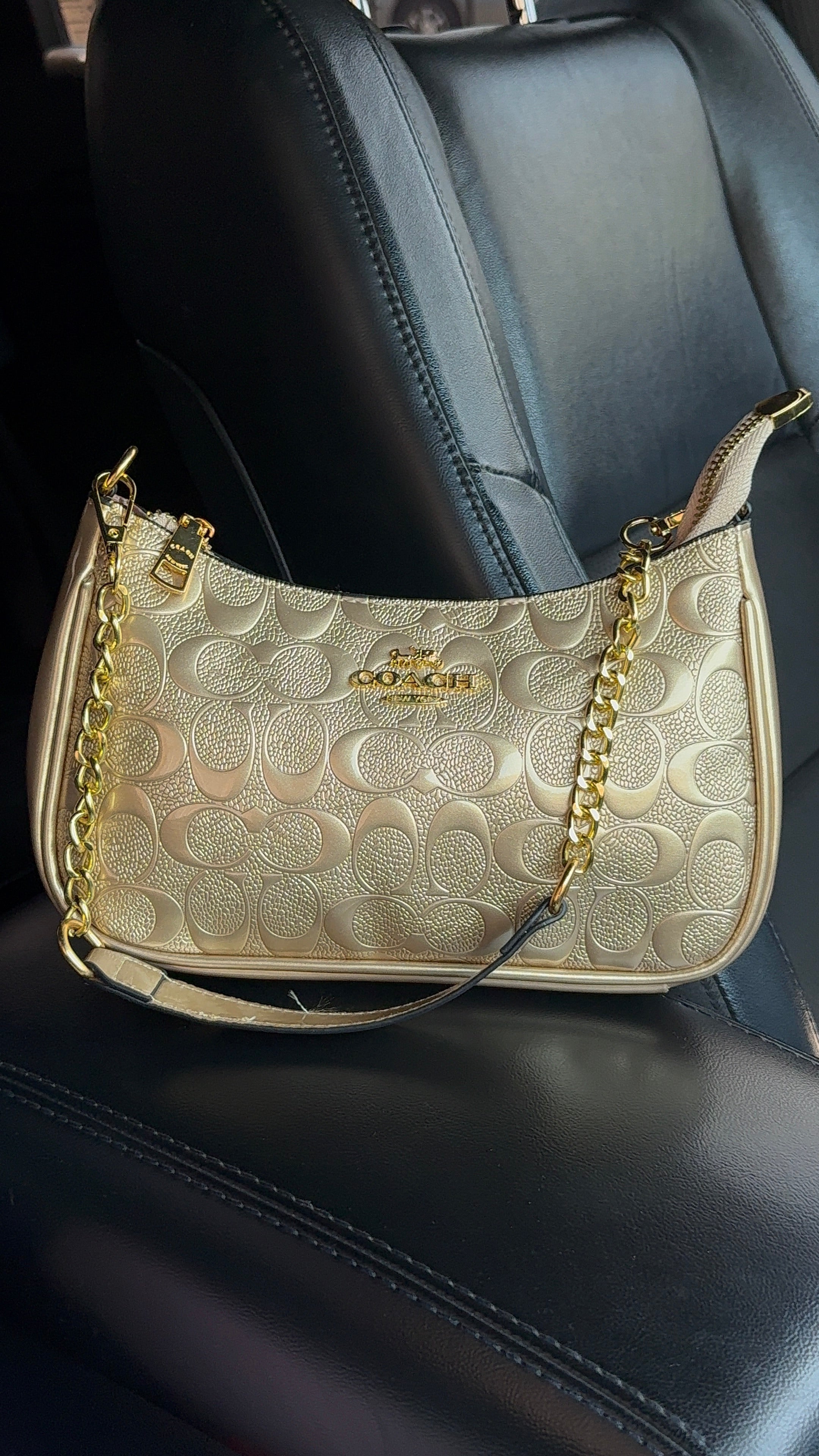 Gold purse with gold straps
