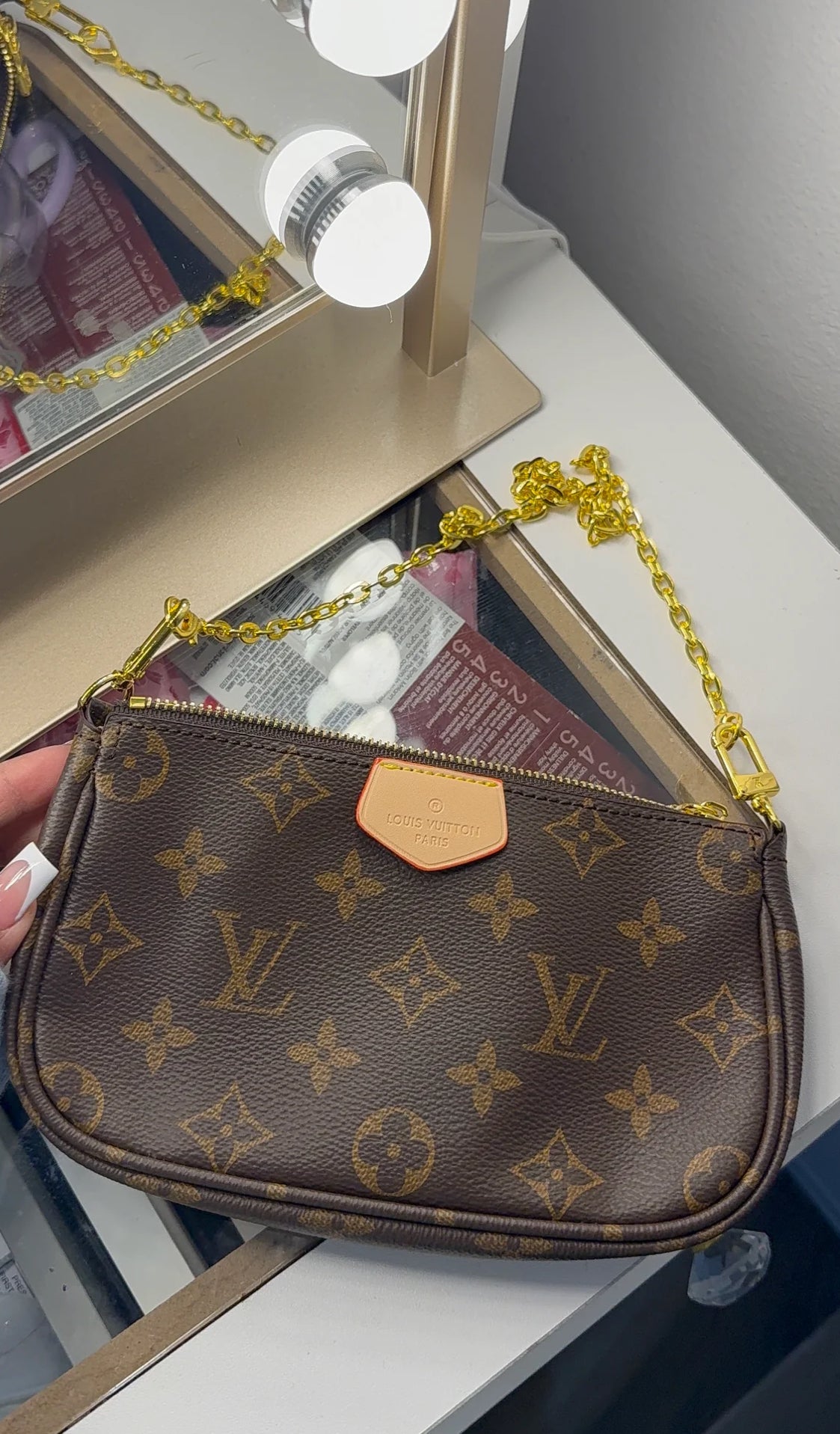 Small monogram purse with gold strap