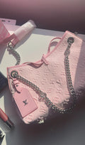 Pink monogram purse with silver straps