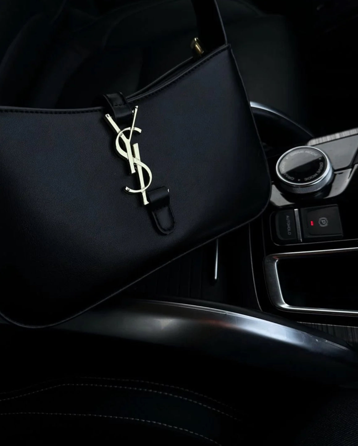 Black purse with gold lettering