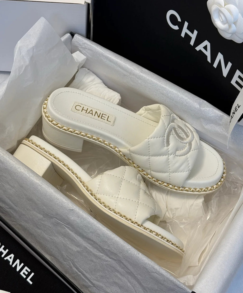 Pearl white heel slides
