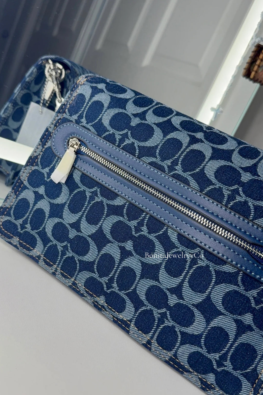 Blue Denim purse with silver wear