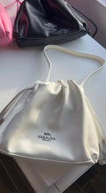 White drawstring purse