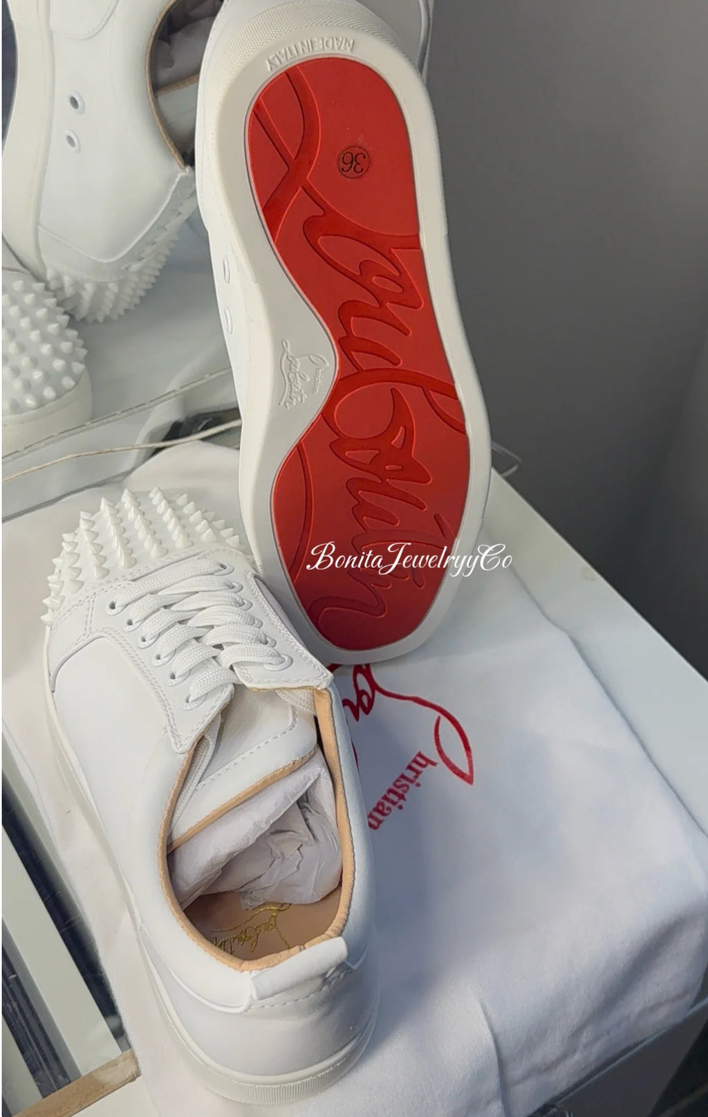 Unisex White red sole shoes