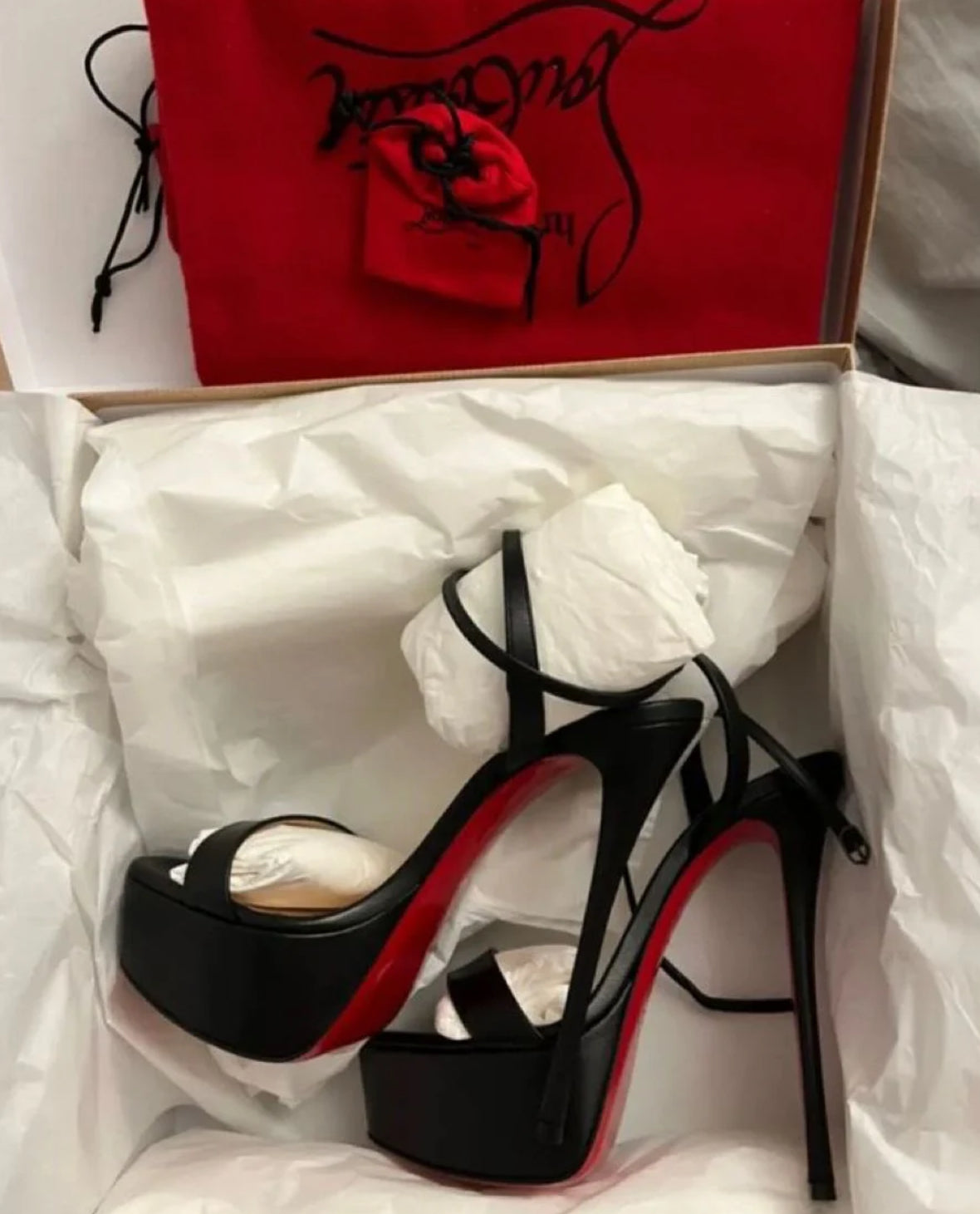 Woman’s Black heels with red sole