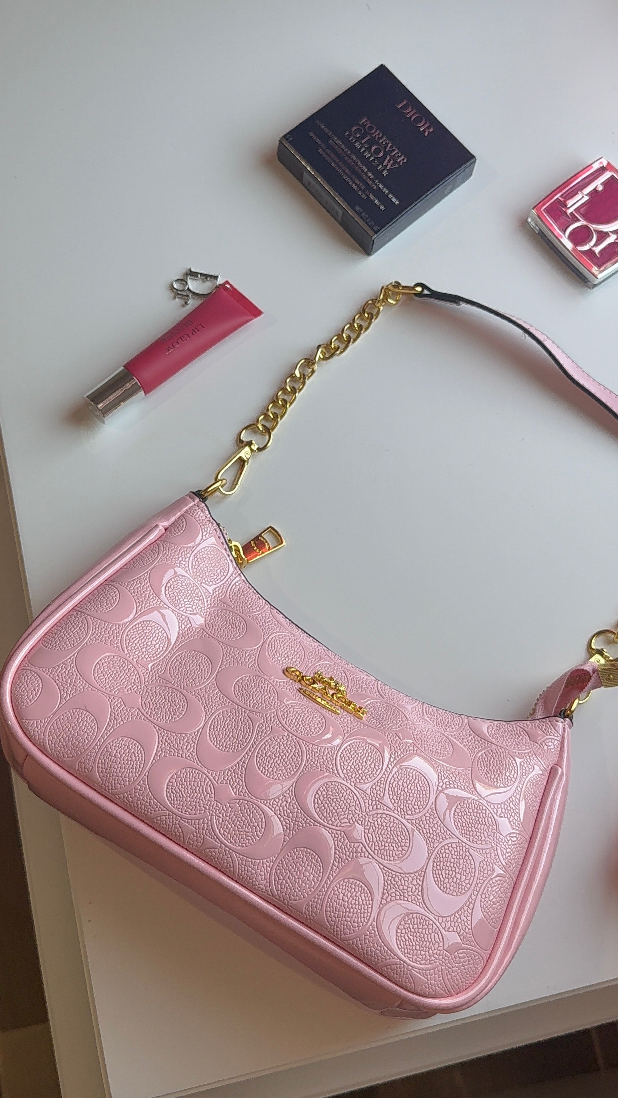 Soft pink purse with gold straps