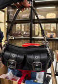 Black purse with cross body strap